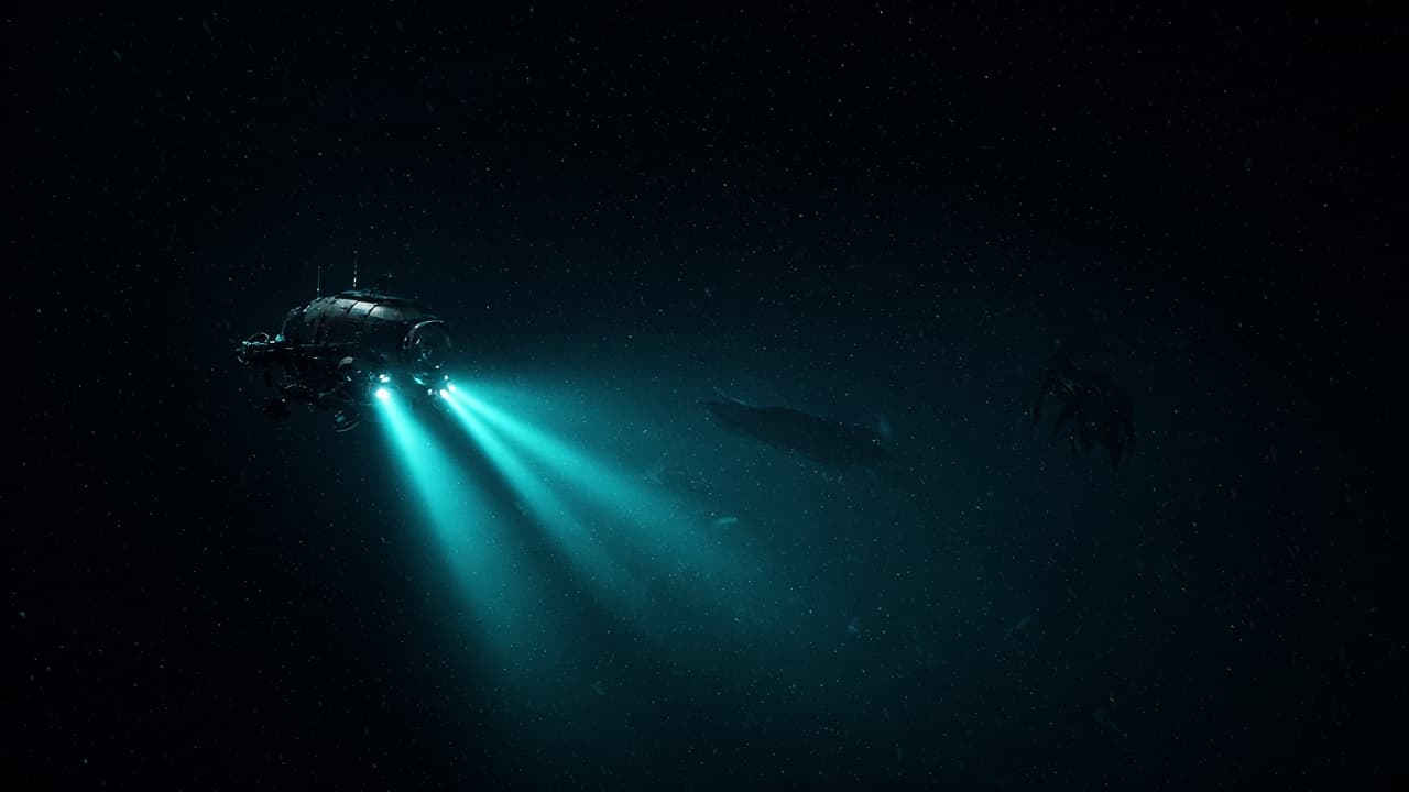 A deep-sea vehicle descending into darkness toward faint silhouettes of marine life